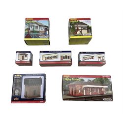 '00' gauge buildings and models including Hornby Skaledale 'Hagley Station' and two Signal Boxes, Bachmann 'Wooden Station Booking Office', 'Wooden Station Waiting Room', 'Wooden Station Gents' and a 'Brick Base Water Tower' (6)