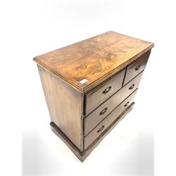 20th century Queen Anne style walnut chest, the cross banded top over two short and two long drawers, raised on bracket supports W82cm, H75cm, D44cm