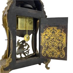 Duchemin of Paris -  Imposing mid-19th century 8-day Louis XV style
ebony and brass inlaid Boulle clock, with a serpentine shaped case surmounted by a detachable top with a winged angel holding a trumpet, with brass scrolling inlaid foliate decoration to the door, front, sides and pediment, case raised on conforming scroll mounts, enamel dial with makers name on the dial and movement backplate, cartouche Roman and Arabic numerals, fully glazed door with putti and visible pendulum, five pillar twin train going barrel movement, recoil anchor escapement and countwheel strike, striking the hours and half hours on a bell.  With key and associated pendulum.