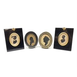 Pair of 19th century oval silhouette portraits 9cm x 6.5cm in ebonised frames and two other silhouettes