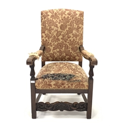 18th century style walnut open armchair, upholstered in floral silk, leaf carved and scrolled arm rests, raised on square supports united by moulded and carved stretchers, W64cm