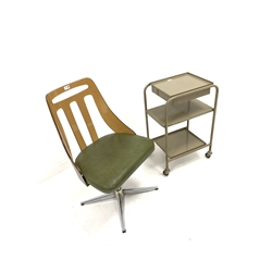 Mid 20th century swivel chair, with moulded Lucite back over leather upholstered seat, raised on chrome cruciform base, (W52cm) together with a 1950s tubular and sheet metal three tier trolley on castors, (W60cm)