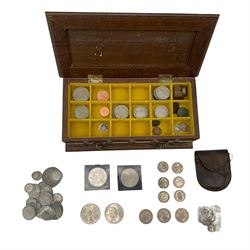 Approximately 18 grams of pre 1920 and approximately 255 grams of pre 1947 Great British silver coins including King George V 1935 crown, various commemorative crowns, pennies and other coinage