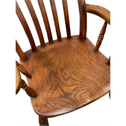 Victorian elm and beech farmhouse chair, the flatted back over elm seat, raised on turned supports 