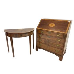 Georgian style mahogany bureau, the drop front with floral inlay revealing fitted interior over four graduated drawers, raised on bracket supports, together with demi lune table of similar design, fitted with one drawer, raised on square tapered supports