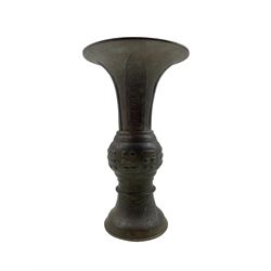 19th century Chinese bronze Gu shape vase with raised pattern of script etc H26cm