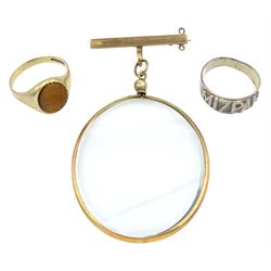 Early 20th century 9ct gold glass portrait frame brooch, 9ct gold tigers eye ring and a Victorian silver 'Mizpah' ring, Birmingham 1881