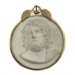 19th century Grand Tour biscuit porcelain portrait plaque, decorated in relief with a bust of the Roman God Jupiter, the plaque claw set to a 9ct gold frame with leaf cresting, H7.5cm x W6.5cm