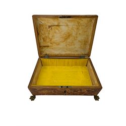 Regency Blonde Tortoiseshell banded sewing box circa 1820, of sarcophagus form, the lid with central raised rectangular panel and vacant silver plaque, raised on four brass paw feet, lacking interior, L26.5cm, H12cm, D20cm