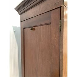Late 19th century figured mahogany double wardrobe, projecting cornice over two panelled doors enclosing an interior converted for hanging, W143cm, H215cm, D63cm