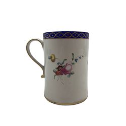 18th century Derby mug painted with sprays of flowers within a blue and gilt border and with loop handle H12.5cm, painted mark circa 1775