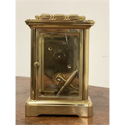 20th century brass four glass carriage clock, white enamel dial with Roman numeral chapter ring, inscribed 'Matthew Norman,' complete with key, and display box, in good working order 
