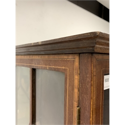 Edwardian mahogany display cabinet, arched top over two tracery glazed doors and two drawers, flanked by two more cabinets, raised on square tapered supports, with all over satinwood banding and boxwood and ebonised string inlay, W126cm, H173cm, D33cm