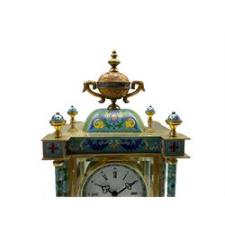 Decorative 20th  century Chinese mantle clock with blue cloisonné decoration and four bevelled glass panels, 8-day two-train spring driven striking movement striking the hours and half hours on a coiled gong, with a flat pediment surmounted by four finials and an ornamental central urn, matching full length pillars to the sides mounted on a conforming plinth on raised feet, dial with Roman numerals, five-minute Arabic's, minute markers and matching steel trefoil hands, visible pendulum with a painted bob