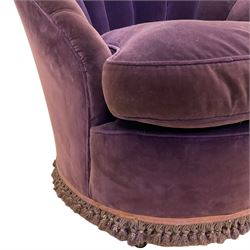 Early to mid-20th century bedroom chair, the fan back upholstered in purple velvet fabric, sprung seat with seat cushion, on castors