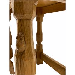 Robert 'Mouseman' Thompson of Kilburn - Yorkshire oak stool, the dished and adzed top raised on four faceted octagonal supports, with mouse signature  W41cm, D27cm, H38cm