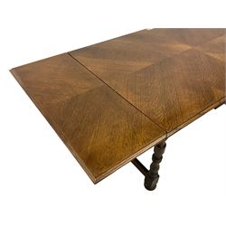 Mid-20th century oak draw leaf extending dining table, rectangular moulded top with quarter-matched veneers, two end leaves, on turned supports united by moulded H stretchers 
