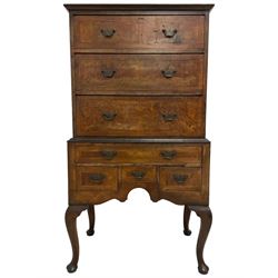 Early 20th century Queen Anne design walnut chest-on-stand, moulded rectangular top over three drawers, the stand fitted with one long drawer and three small drawers, each drawer inlaid with feather banding and fitted with shaped handle plates, shaped apron on cabriole supports
