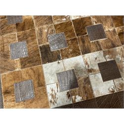 Contemporary cowhide patchwork rug, the field decorated with squares of brown brindle cowhide with faux crocodile leather panels, surrounded by a border of mock crocodile skin, beige suede underside