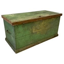 19th century green painted pine tool chest. the hinged lid enclosing tray with compartments, fitted with wrought metal carrying handles, on plinth base
