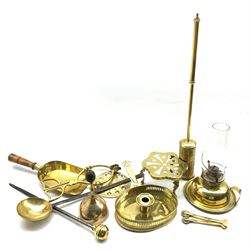 Two 19th century brass pastry cutters, 18th/19th century iron and brass spoon, brass trivet, matched companion set, 19th century brass chamberstick together with other metal wares