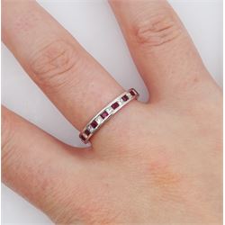 18ct white gold channel set princess cut ruby and round brilliant cut diamond half eternity ring, stamped 750