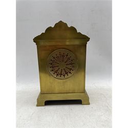 A late 19th century French mantle clock in a brass break-front case with a shaped pediment and cornice, applied cast brass ornamentation on a stepped plinth, two-part dial with a gilt centre and enamel chapter ring, Arabic numerals and steel fleur di Lis hands, with an eight-day rack striking movement, striking the hours and half-hours on a coiled gong. 


