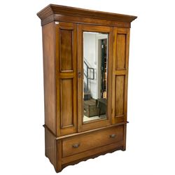 19th century mahogany wardrobe, projecting cornice over panelled front with central bevelled mirror door, drawer to base, shaped apron