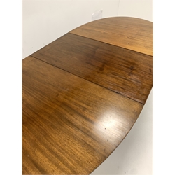 Edwardian mahogany oval extending dining table, raised on ring turned, tapered, fluted and reeded supports, with one additional leaf, wind out mechanism stamped 'Joseph Fitter, Britannia works'