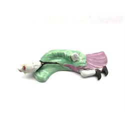 Chinese Qianlong figure of a reclining lady holding a book in one hand decorated in green and purple H14cm 