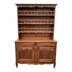 Mid to late 20th century French oak dresser, the raised back fitted with three heights, the base fitted with two drawers and two cupboards