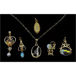 Five 9ct gold stone set pendants including diamond, opal and pearl and a 9ct gold diamond initial pendant necklace