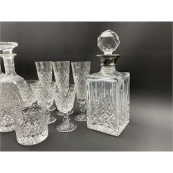Stuart crystal Hardwicke pattern  table glass comprising six tumblers, six claret glasses, five champagne flutes and a pair of decanters, together a square spirit decanter with silver collar and one other spirit decanter (21)