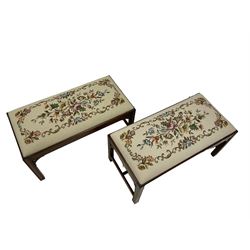 Pair of Georgian design mahogany rectangular stools, with drop in pads upholstered by Peter Silk if Helmsley, raised on square supports, terminating in brass castors 