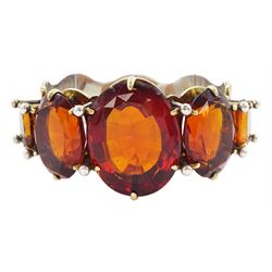 Victorian large silver graduating oval cut citrine bracelet, with articulated bright cut foliate link panels