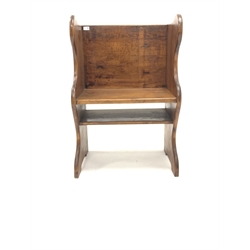 Pitch pine single seat pew, with seat panel raised on shaped panel end supports, W62cm