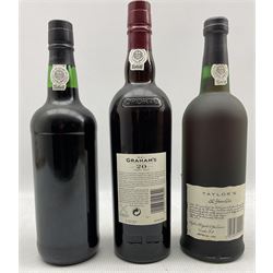 Three bottles of port comprising Graham's Tawny Port aged 20 years 75cl, 20% vol., Taylor;s 20 Years Old Port 75cl, 20% vol. and Smith Woodhouse Fine Vintage Character Port, 20% vol. 75cl (3)
