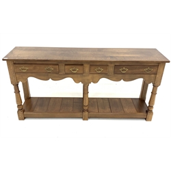 18th century style solid oak dresser, with two short and two longer drawers, shaped apron, turned and block supports, pot board base, W180cm, H85cm, D46cm
