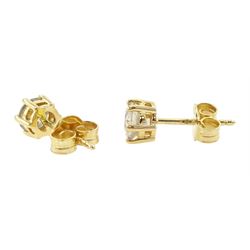 Pair of 18ct gold round brilliant cut diamond stud earrings, stamped 750, total diamond weight 1.05 carat, with World Gemological Institute report