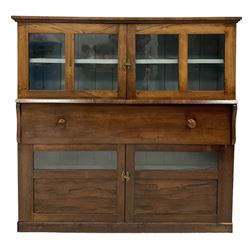 19th century rosewood and mahogany cabinet, fitted with four cupboards and central drawer, raised on a plinth base 
