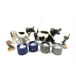 Four Swarovski crystal figures comprising a Dove, Hedgehog, Shell with Pearl and Pig, three pottery Cows, two Royal Crown Derby birds: Blue Tit and Robin and a Spanish pottery model of a Horse 