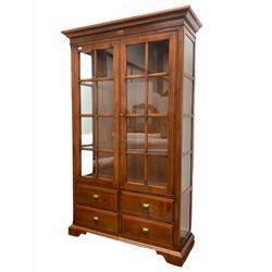 20th century cherry display cabinet, two glazed doors enclosing three glass shelves, four drawers to base, raised on bracket supports W127cm, H205cm, D45cm