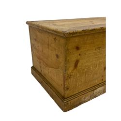 19th century scumbled pine blanket chest, rectangular hinged top, the interior fitted with three small drawers, lower moulded edge over plinth base