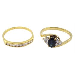 18ct gold channel set nine stone round brilliant cut diamond ring and a 9ct gold sapphire and diamond cluster ring, both hallmarked