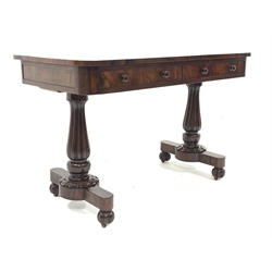 William IV rosewood library table, the well figured rectangular top over two drawers, raised on two baluster turned and lobe carved end supports each leading to platform base, bun feet and recessed castors, 122cm x 61cm, H75cm