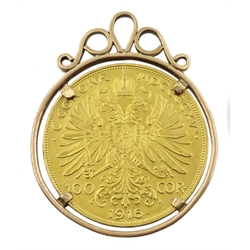 Austrian 1915 re-strike gold 100 corona coin, in a  9ct gold (tested) mount, total weight 41.2 grams 