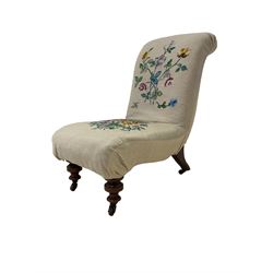 Late 19th century mahogany framed nursing chair, upholstered in floral needlework upholstery, on turned supports