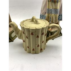 Pair of Continental bisques each playing a tambourine, H49cm together with a Wedgwood Jasperware Bamboo moulded teapot, impressed beneath (3)