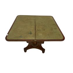 Regency plum pudding mahogany card table, fold over revolving top revealing baize lined playing surface, frieze with moulded beaded edge with flanking roundel design, column with lobe carved collar, quadruform base with applied rose detail to the turned feet