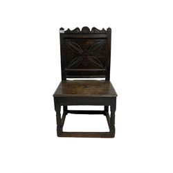 Oak panelled chair with carved back, raised on turned supports with stretchers 